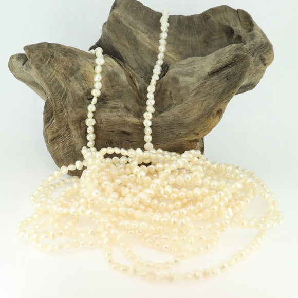 Fresh Water Baroque Pearl Necklace 3-4mm White 141 Inches
